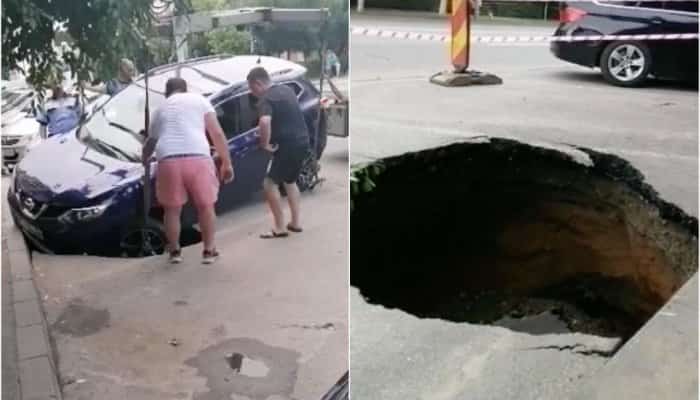 O șoferiță a căzut cu mașina într-un crater format în asfaltul unui bulevard din Craiova