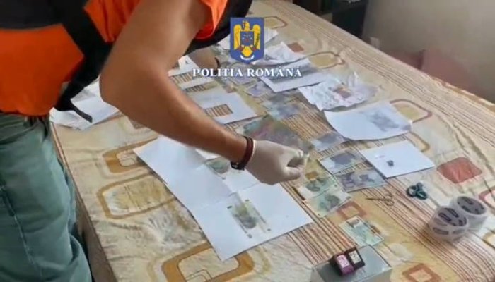 VIDEO | Doi bărbați reținuți după ce au cumpărat o mașină cu bani falși, scoși la imprimantă